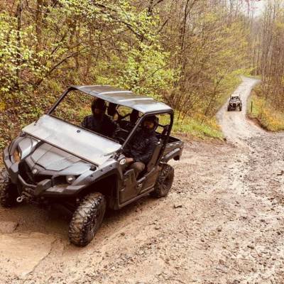 a car parked on a dirt road