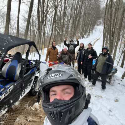 a group of people that are standing in the snow
