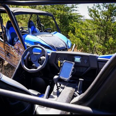 a motorcycle parked on the side of a car
